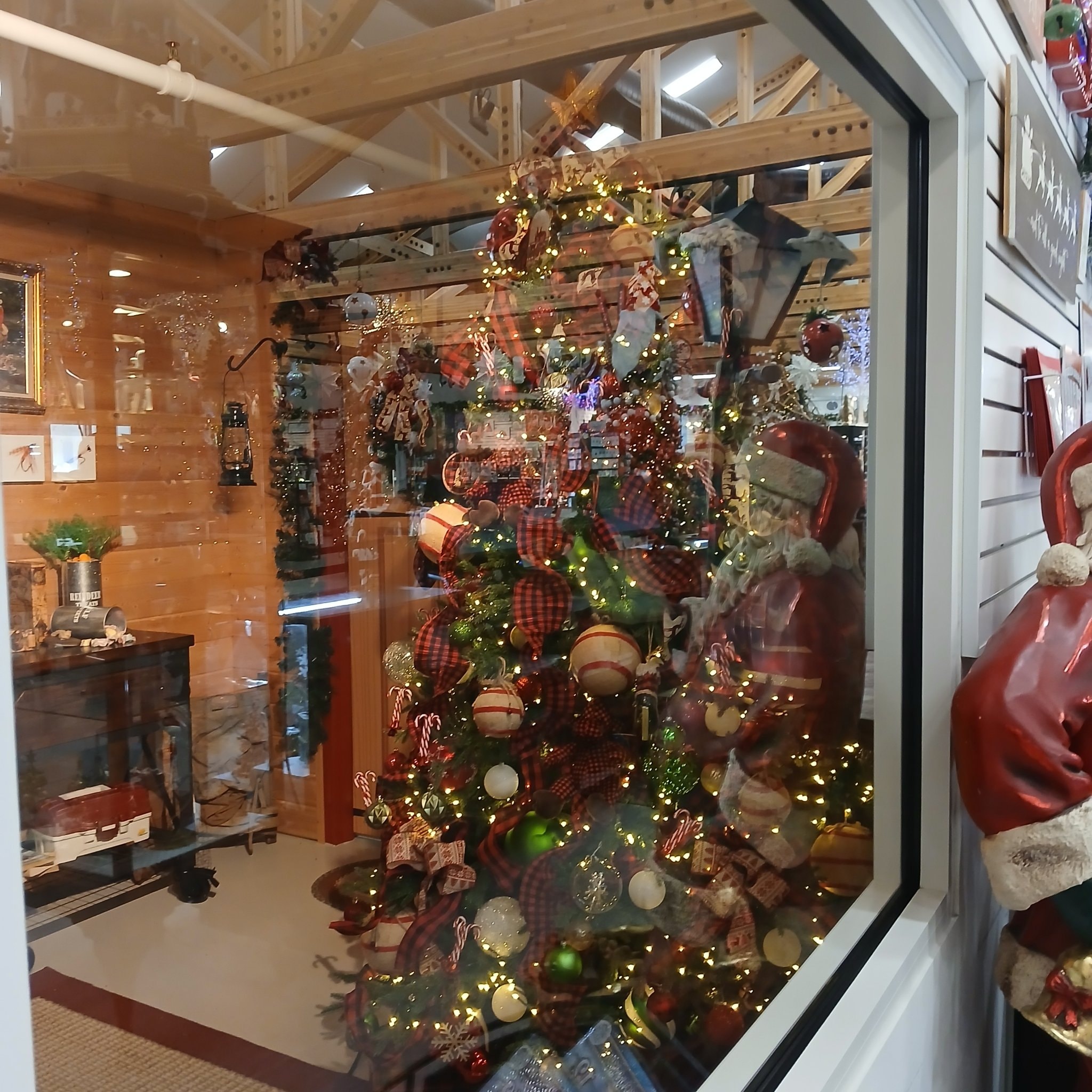 Decorated Christmas trees and Santa's sleigh display at North Pole, Alaska