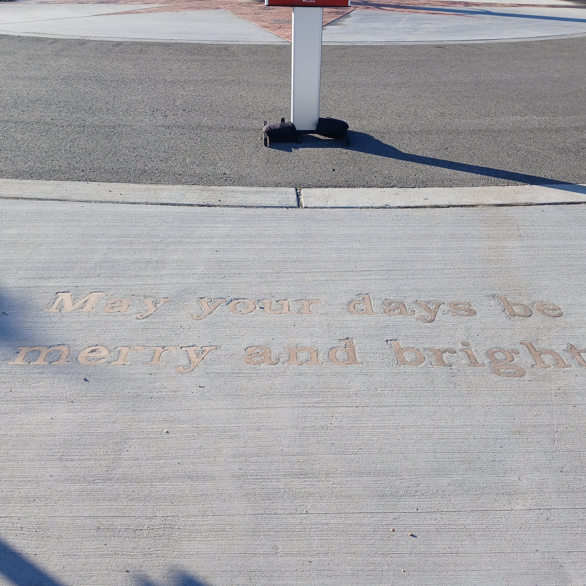 May your days be merry and bright engraved in the sidewalk at North Pole, Alaska