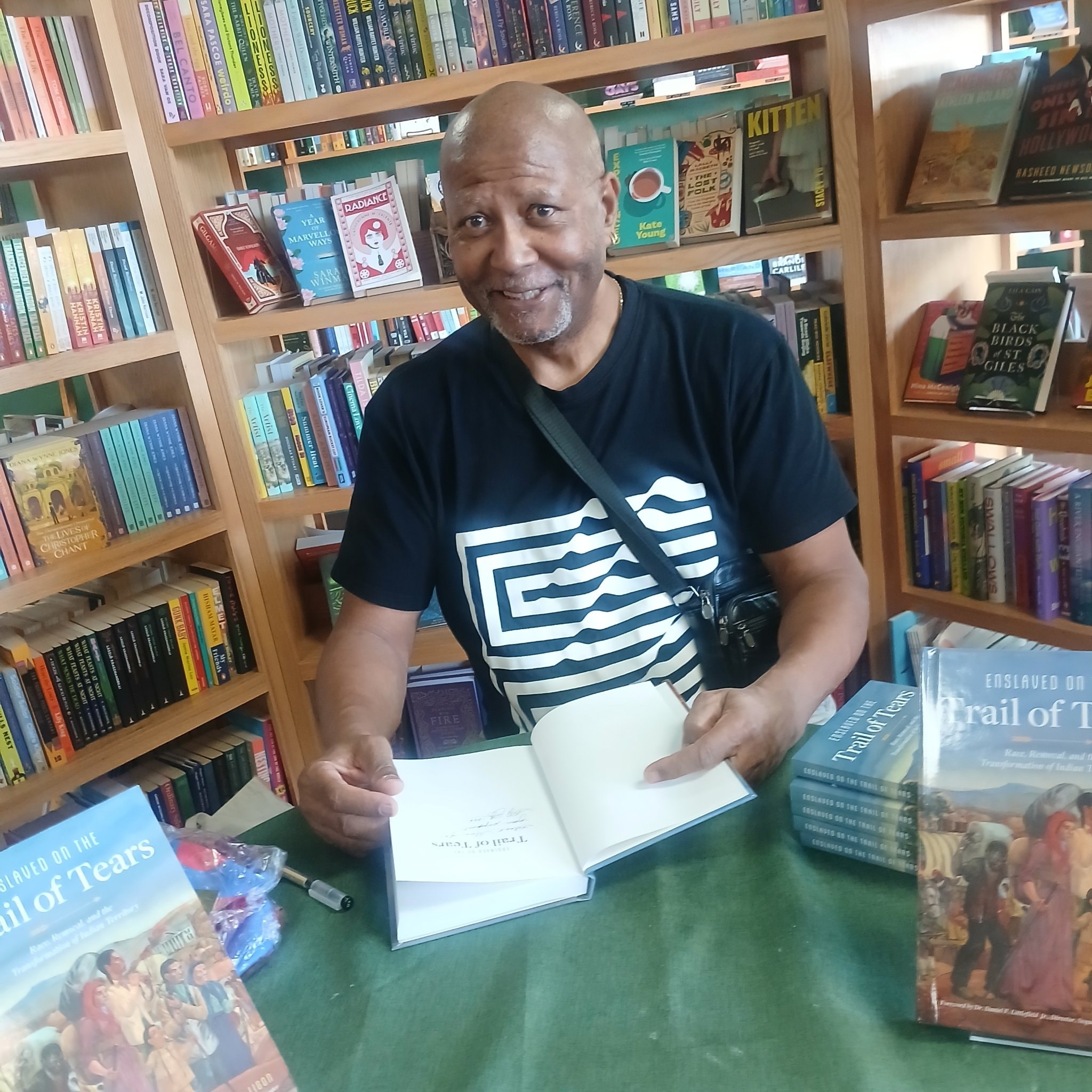 Author signing Trail of Tears book at book signing event
